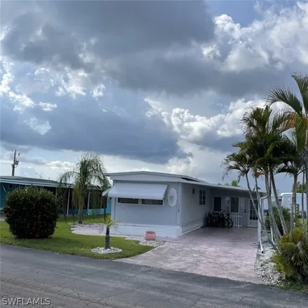 Buy this 2 bed house on 94 Mercury Lane in Tamiami Village & RV Park, Lee County