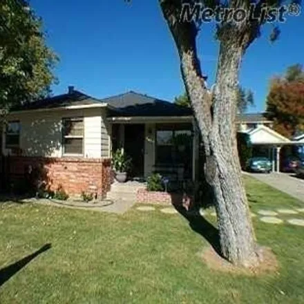 Buy this 8 bed house on 3083 33rd Avenue in Sacramento, CA 95824