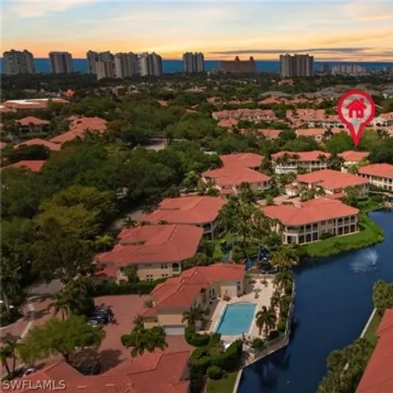 Buy this 3 bed condo on L Ambiance Circle in Pelican Bay, FL 34108