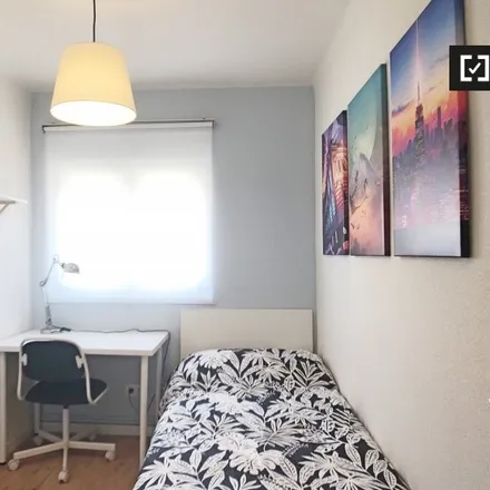 Rent this 7 bed room on Madrid in Centro Deportivo SAGE 2000, Calle de Escalona