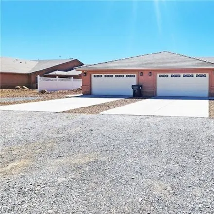 Rent this 3 bed house on 1221 Bourbon Street in Pahrump, NV 89048