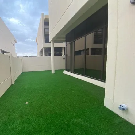 Rent this 3 bed townhouse on Akoya Sancnary in Damac Hills 2, Dubai
