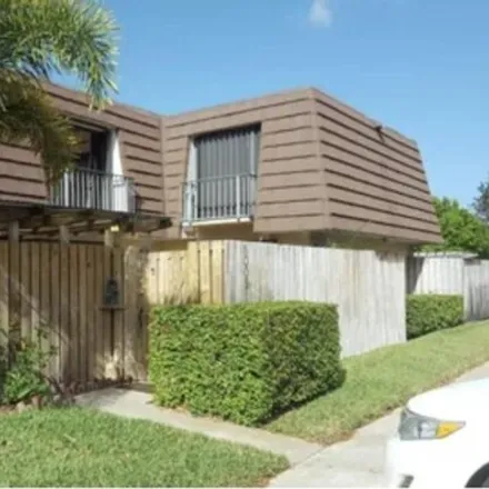 Rent this 3 bed house on 1099 10th Lane in Palm Beach Gardens, FL 33418