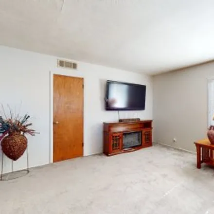 Buy this 3 bed apartment on 718 Grove Street Northeast in Northeast Albuquerque, Albuquerque