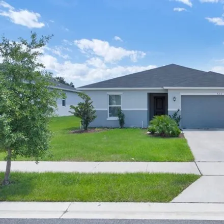 Rent this 4 bed house on 425 Summer Grove Ln in Haines City, Florida