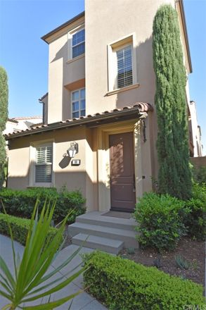 Rent this 3 bed townhouse on 86 Strawberry Grove in Irvine, CA 92620