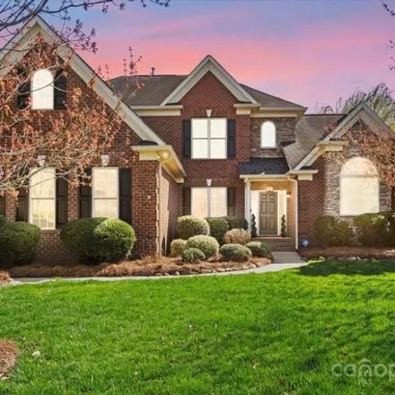 Buy this 6 bed house on 5903 Four Wood Drive in Matthews, NC 28014
