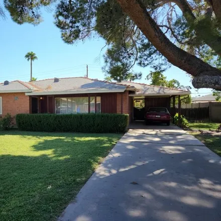 Buy this 3 bed house on 4107 East Edgemont Avenue in Phoenix, AZ 85008